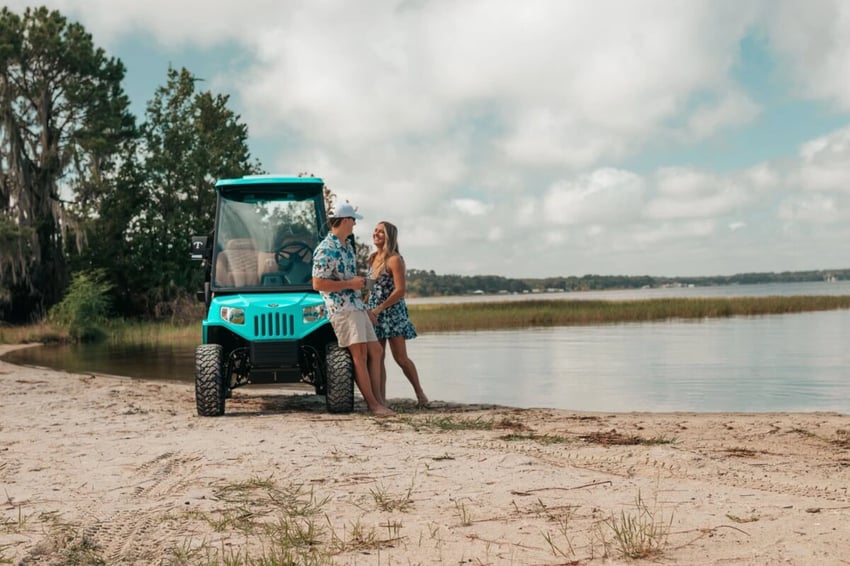 couple leaning against beachcomber